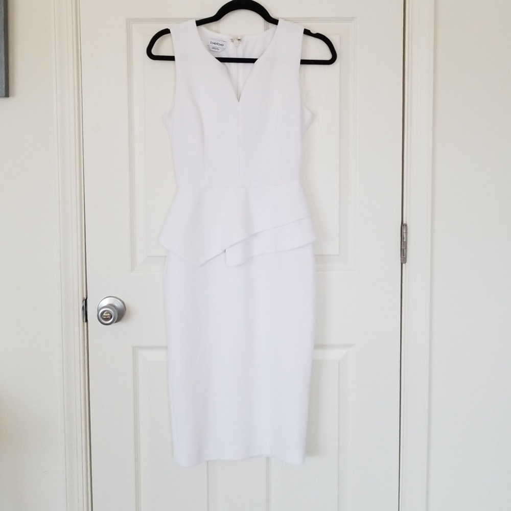 Pure white bebe peplum midi dress